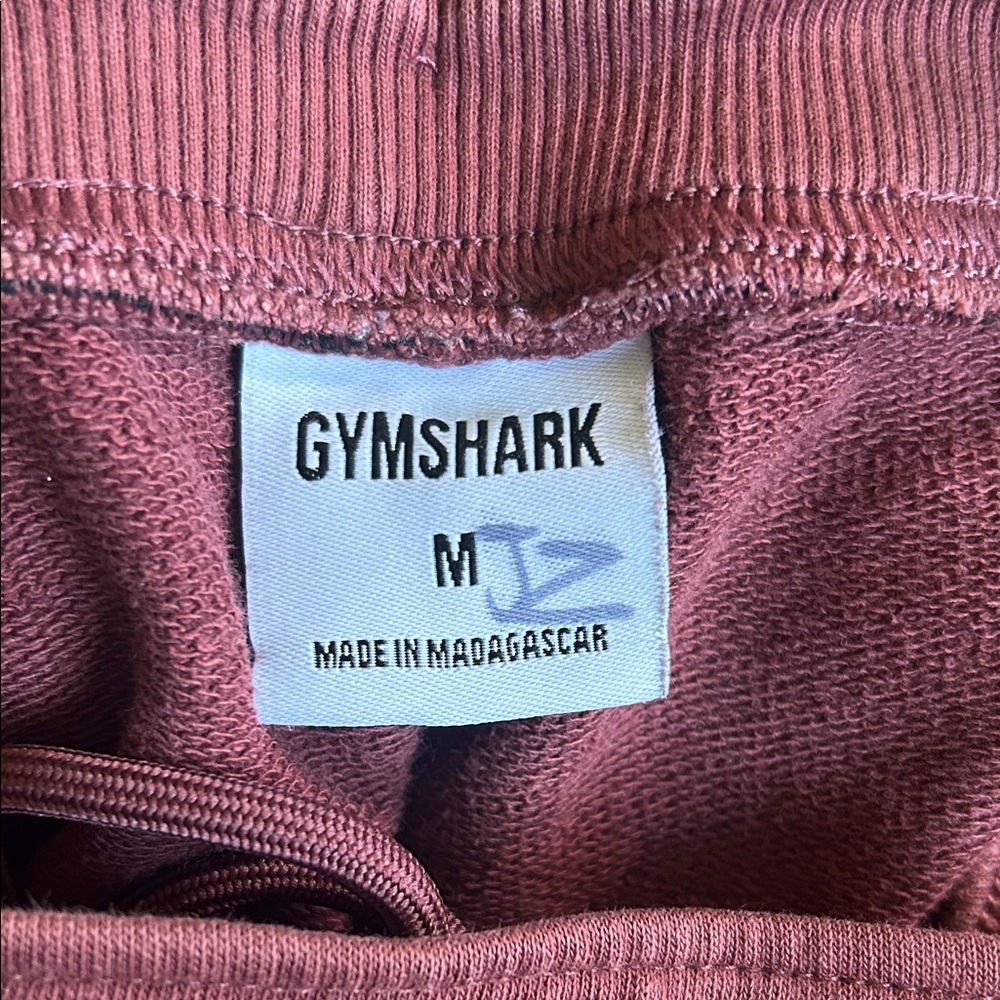 Gymshark Women's Maroon Athletic Shorts with Orange Logo Panel - Picture 2 of 3